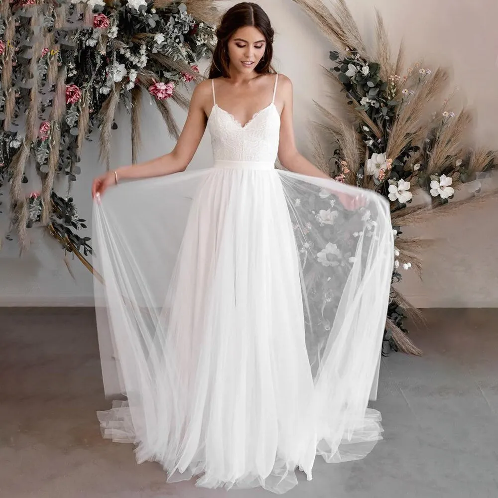 A-Line Tulle Spaghetti Straps Wedding Dresses With Lace Appliques