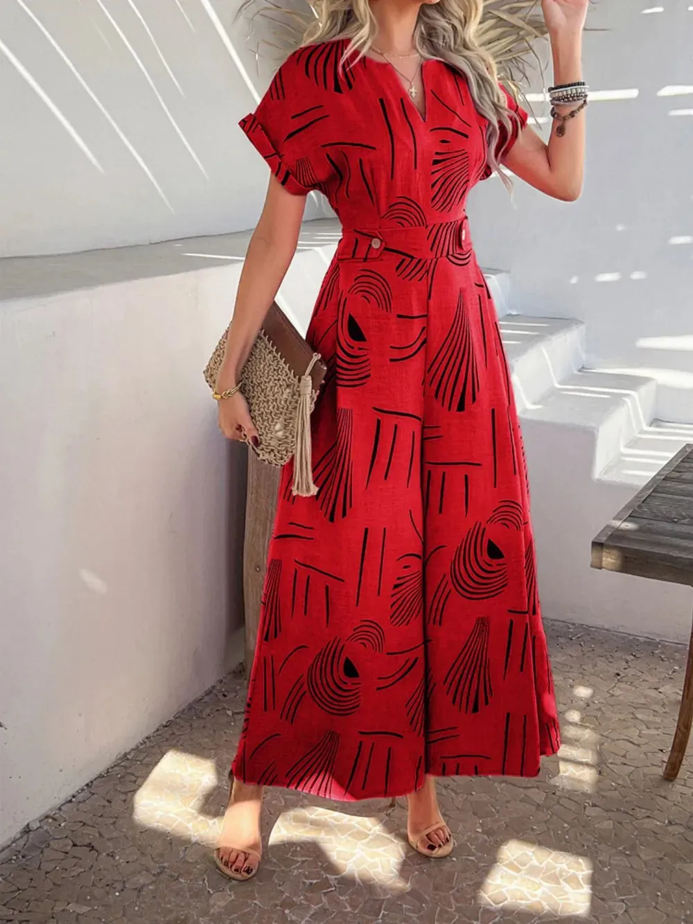Devine Printed Notched Short Sleeve Wide Leg Jumpsuit