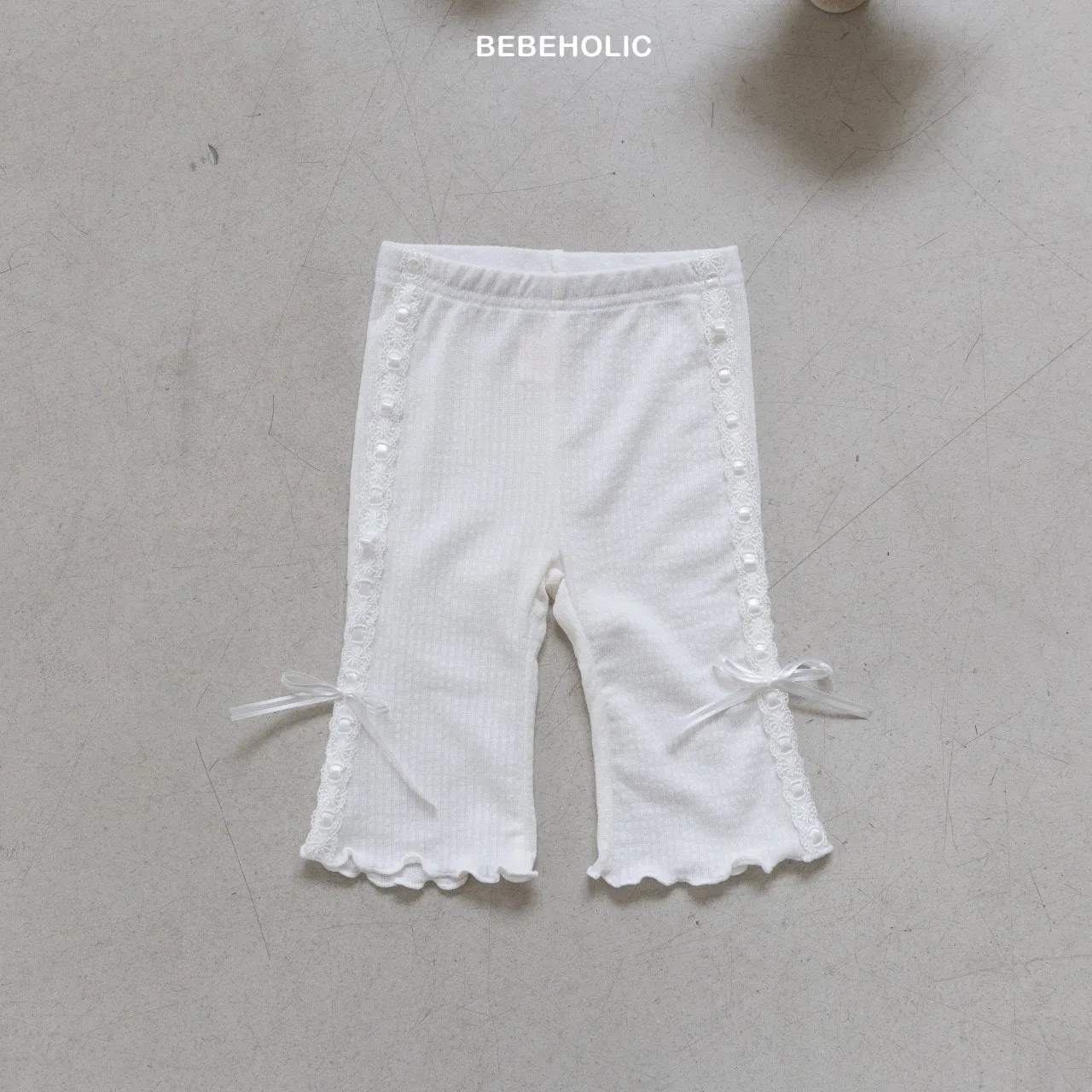 Ribbon bootcut pants
