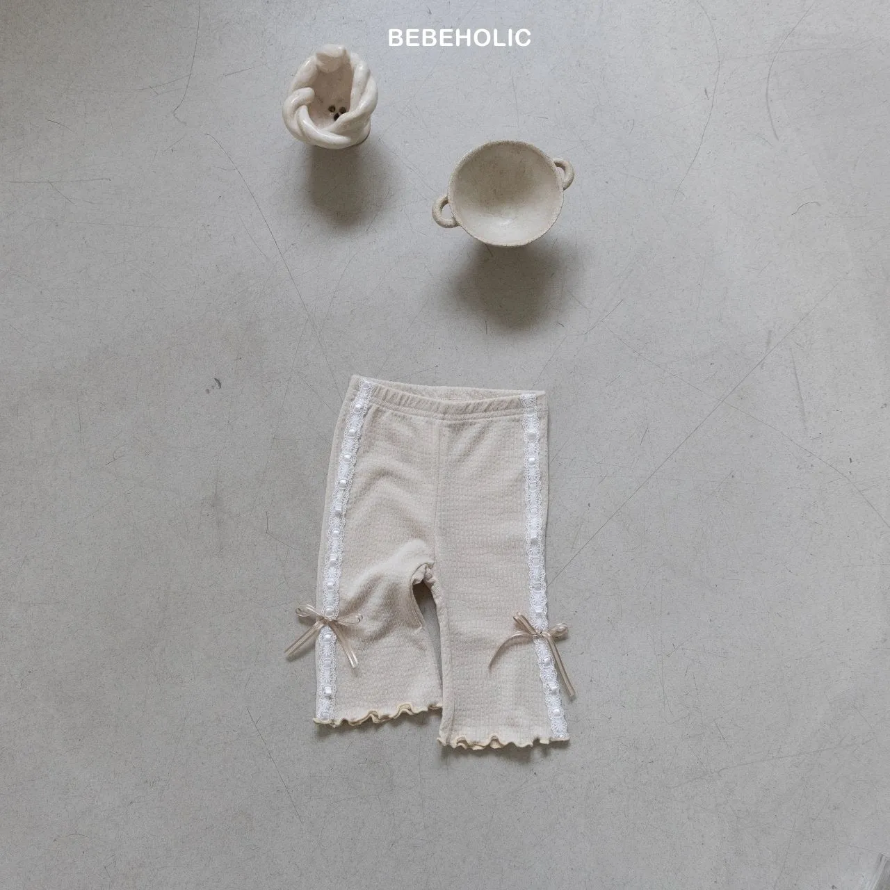 Ribbon bootcut pants