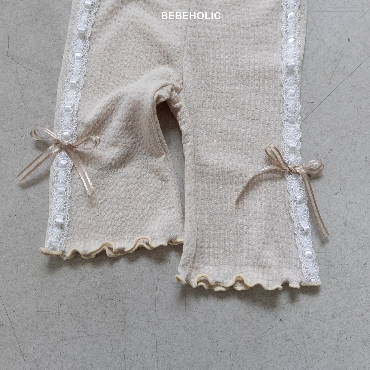 Ribbon bootcut pants