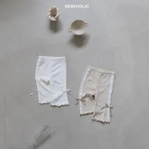 Ribbon bootcut pants