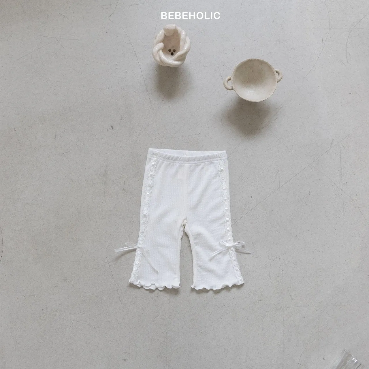 Ribbon bootcut pants