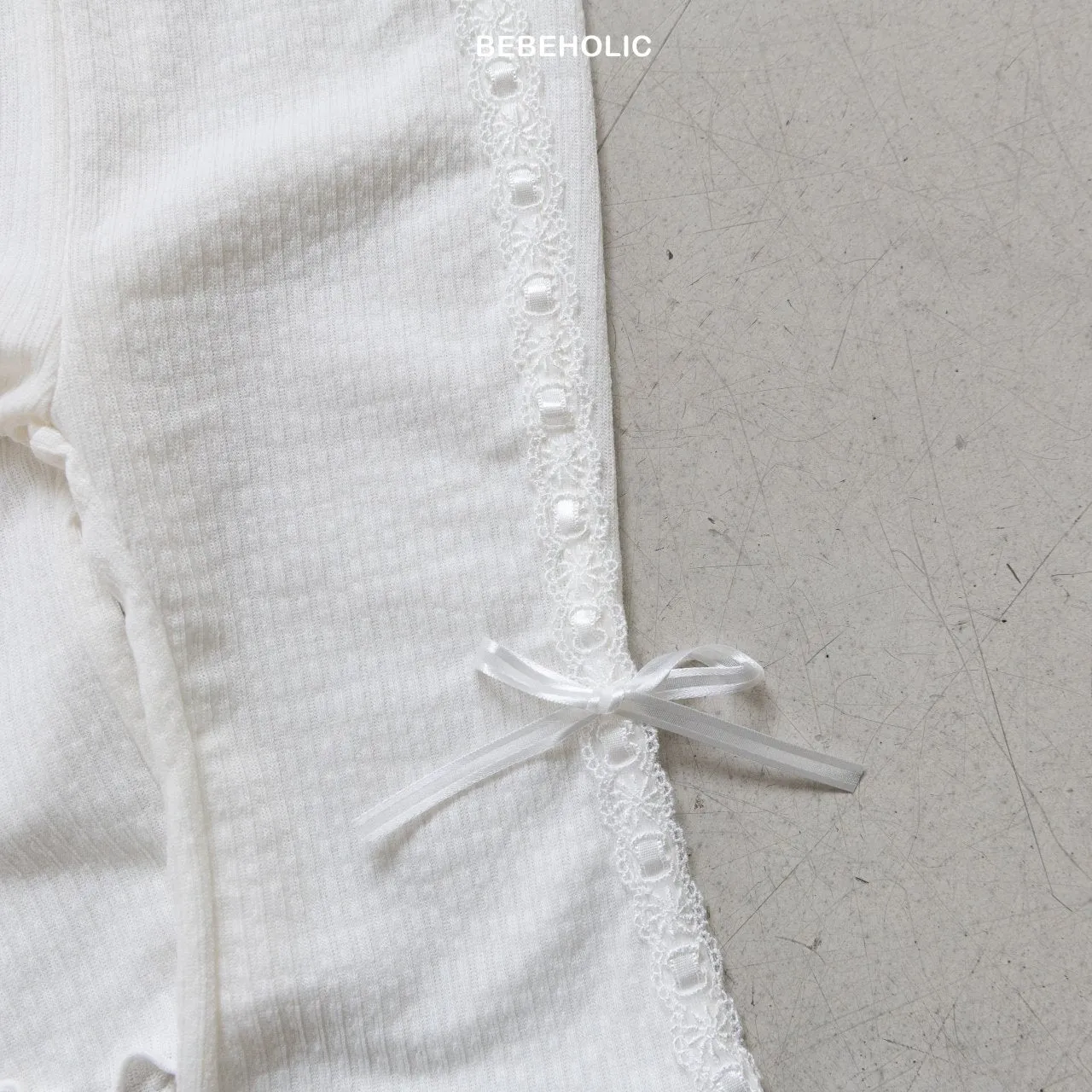 Ribbon bootcut pants