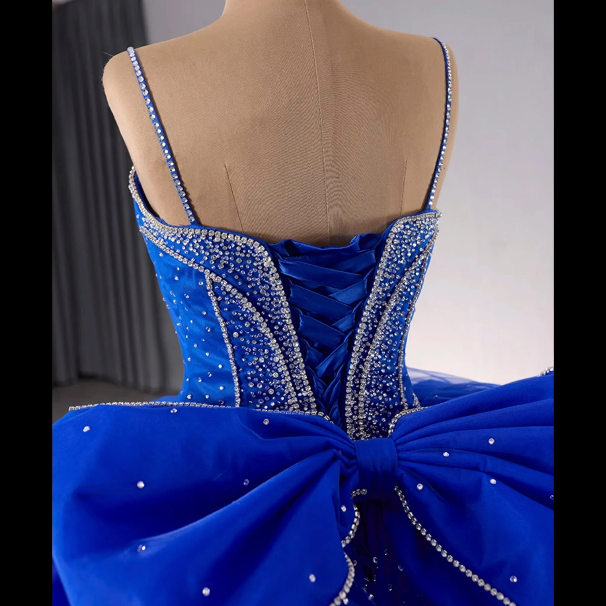 Sparkly V-neck Quinceanera Dress Ball Gown with Spaghetti Straps
