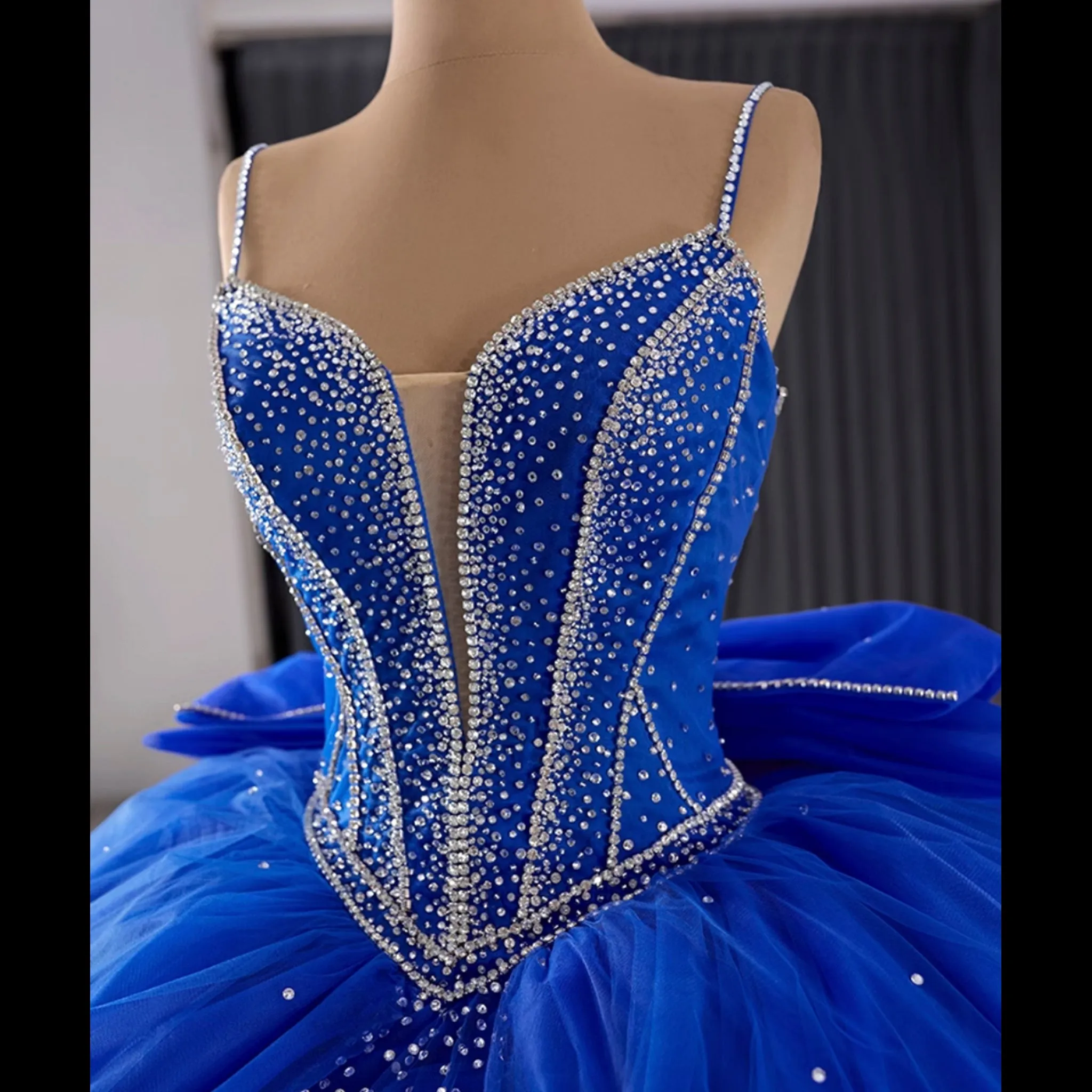 Sparkly V-neck Quinceanera Dress Ball Gown with Spaghetti Straps