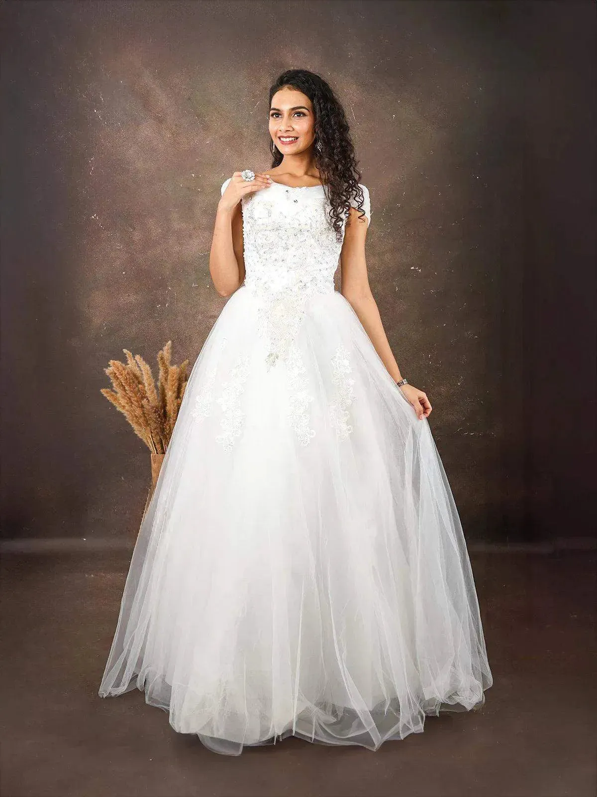 White Net Gown Embellished with Floral Thread Work Embroidery