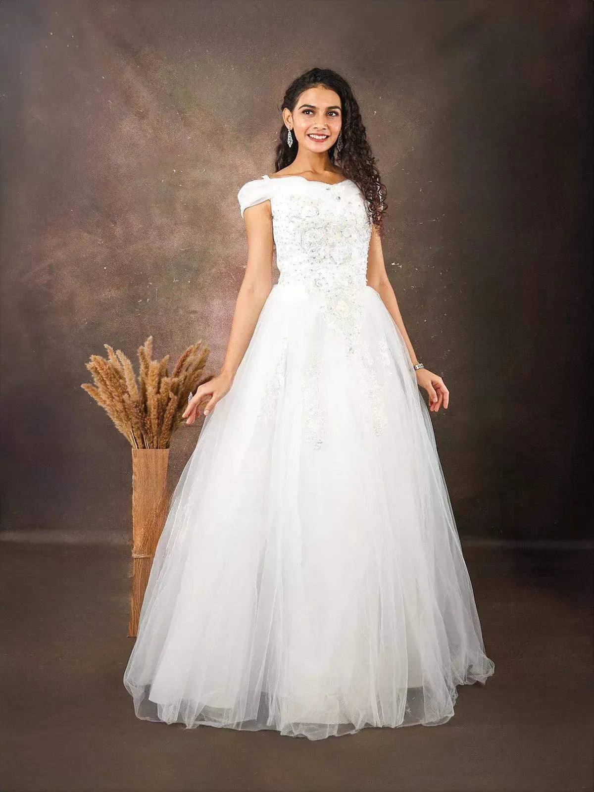 White Net Gown Embellished with Floral Thread Work Embroidery